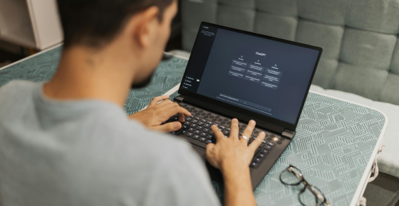 Man on computer using ChatGPT